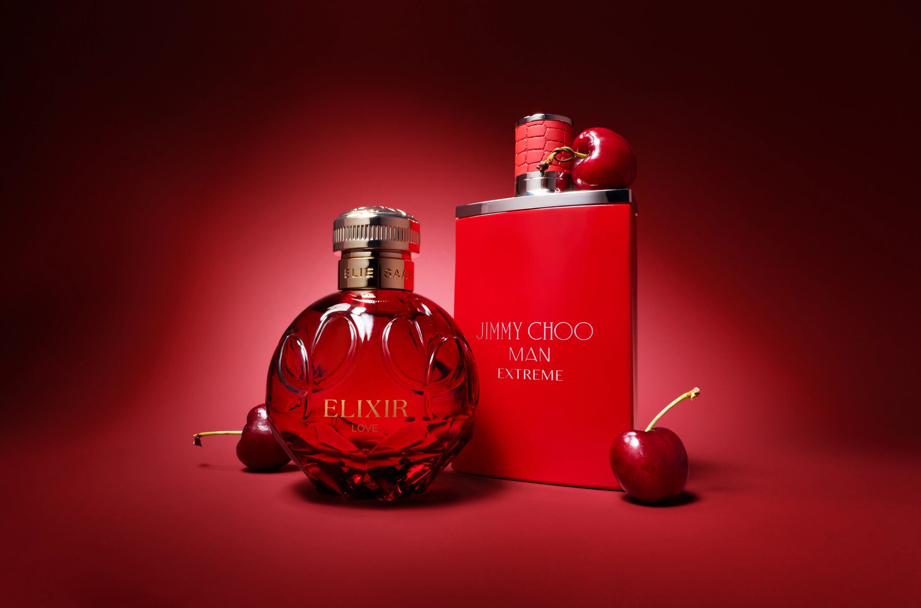 Woolworths beauty gifting hero shot with red cherries, Elie Saab and Jimmy Choo fragrances